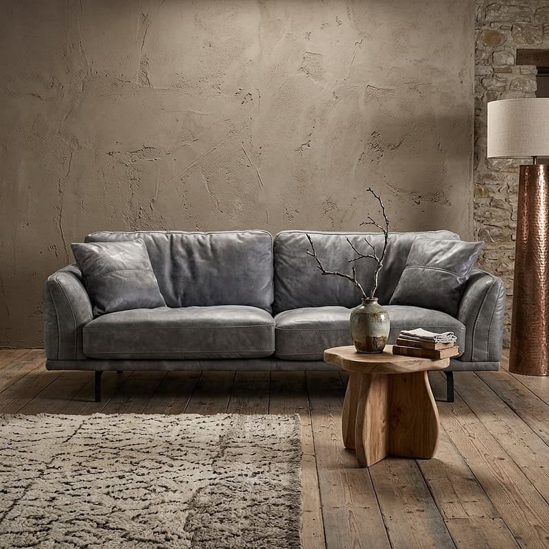 Luxe bank Dakar in een modern interieur met rustieke elementen, perfect voor een stijlvolle woonkamer. Gemaakt van hoogwaardige materialen voor comfort en duurzaamheid.