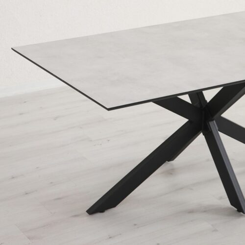 Eetkamertafel roderigo zwarte metalen spider leg poot laminaat nijwie rechthoek
