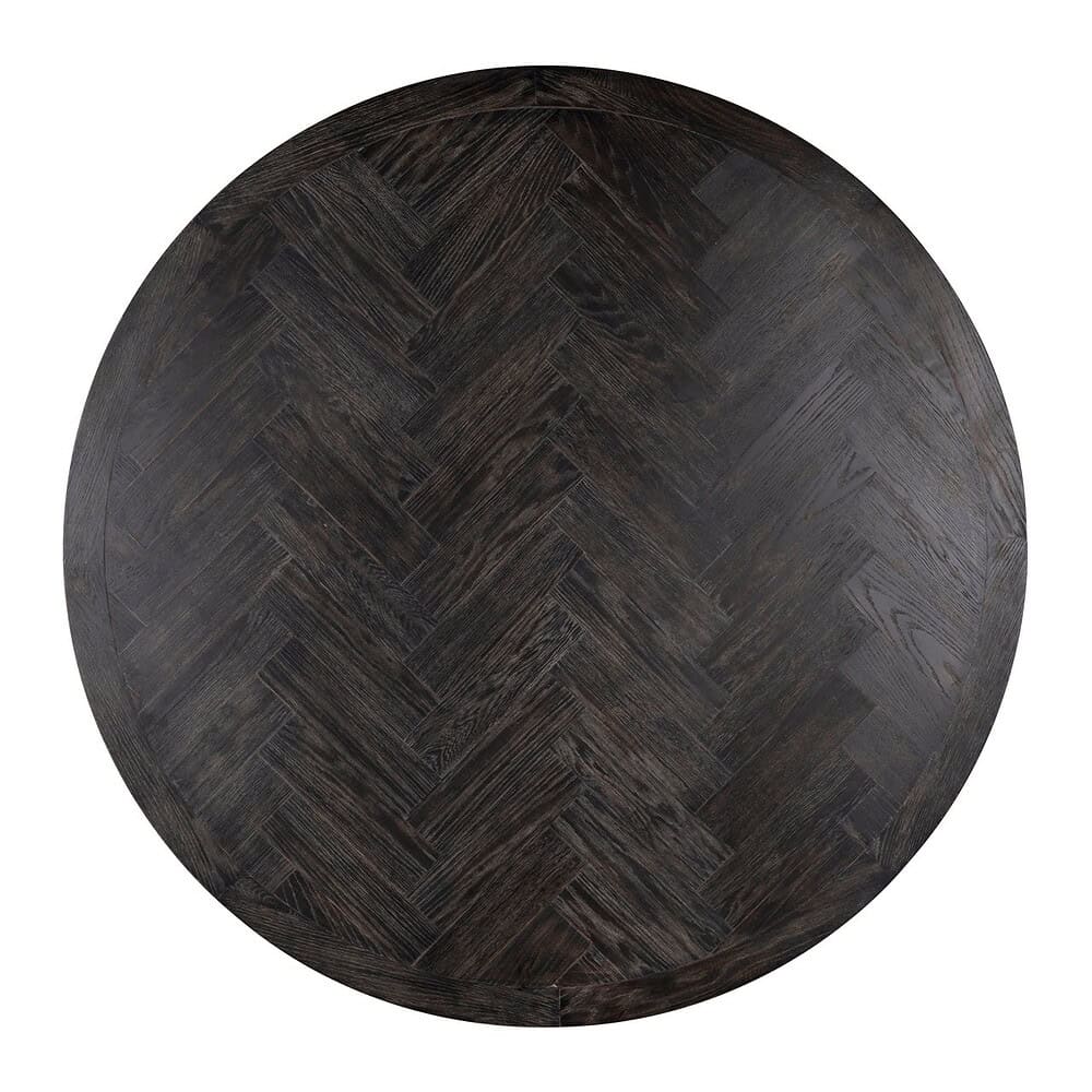 Eikenhouten ronde eettafel met visgraatpatroon, hoogwaardig meubelstuk van Mokana Meubelen, elegant en duurzaam.