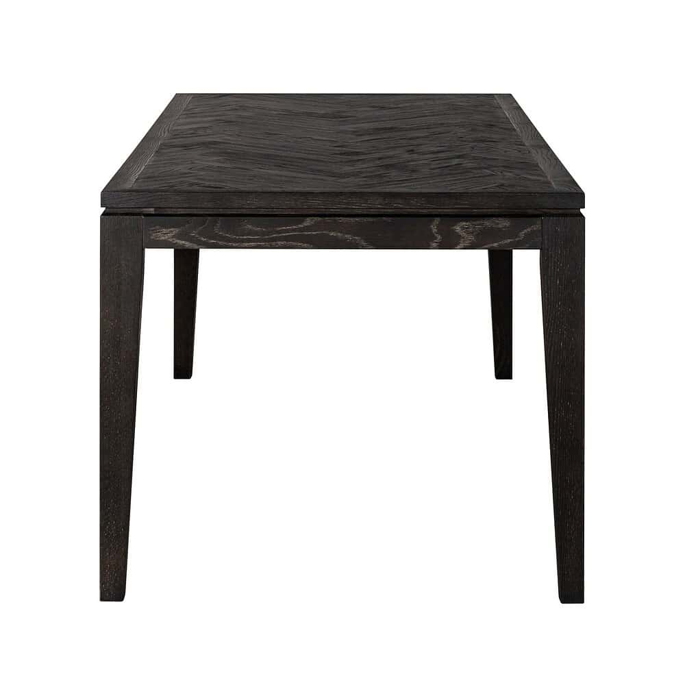 Elegante zwarte eettafel van massief hout, perfect voor modern en industrieel interieur, maatwerk mogelijk door Mokana Meubelen.