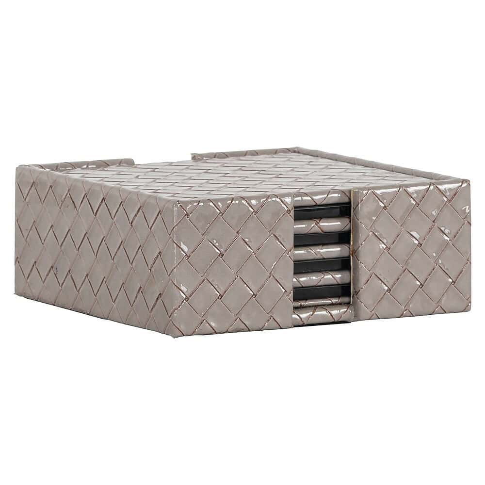 Robuuste gestoffeerde koffie- of salontafel met gevlochten patroon en opberglade, perfect voor moderne woonkamer decoratie.