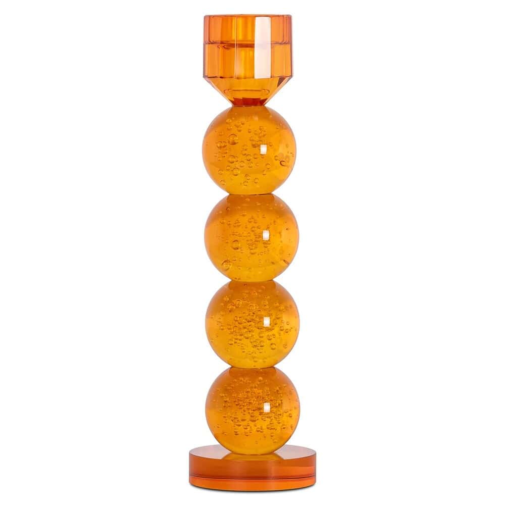 Gele/bruine glasobject met bolvormige bubbels en geometrisch geslepen bovenkant, decoratief en modern design.