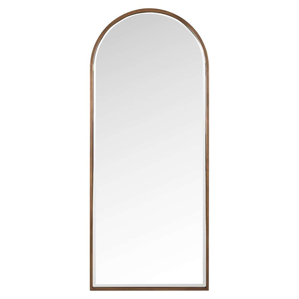 Elegante arched spiegel met houten lijst, perfect voor de woonkamer of slaapkamer. Accessoire voor stijlvolle interieurdecoratie en functioneel voor dagelijks gebruik.