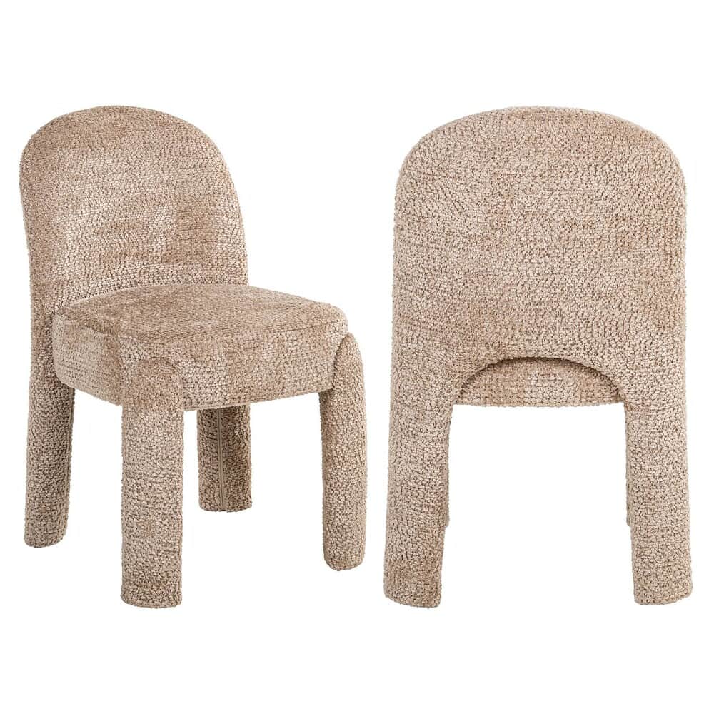Soft beige plush upholstered accent chairs with rounded backs and plush cushions, perfect for modern living rooms and lounges.