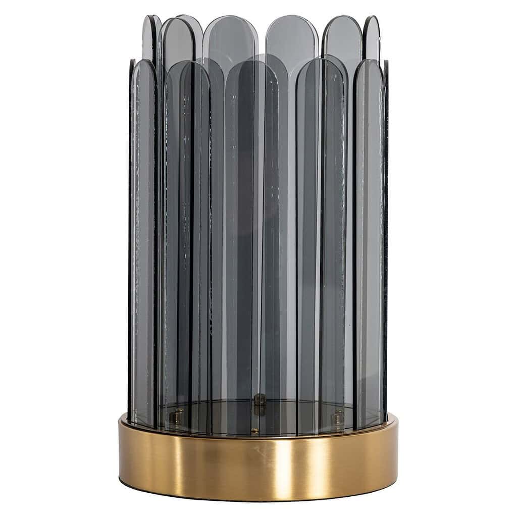 Zilverkleurige tafellamp met glazen bilaren en goudkleurige basis, elegante design verlichting voor modern interieur.