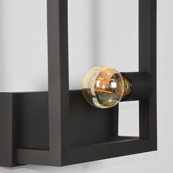 Eenvoudige zwarte wandlamp met zichtbaar filament gloeilamp, modern en industrieel design voor woonkamer of kantoor.