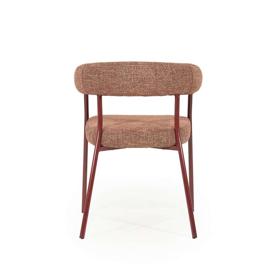 Modern vintage fleurig eetkamerstoel met comfortabele bekleding en rood houten frame, perfect voor een stijlvolle én gezellige eethoek.