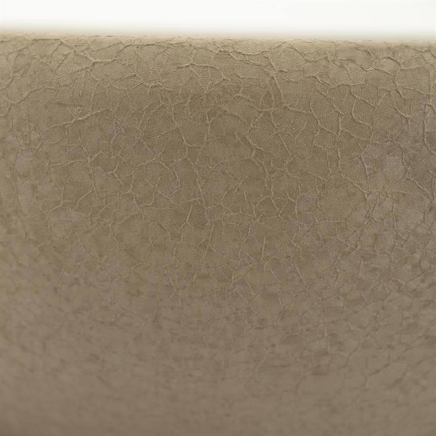 Gebruikte afbeelding van Mokana Meubelen met een close-up van beige, getextureerd en gebarsten leer- of materiaaloppervlak, perfect voor het accentueren van luxe en natuurlijke materialen in meubelontwerp.
