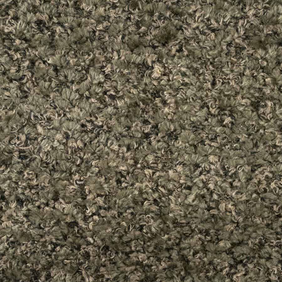 Gekrulde vloerbedekking in grijstinten, zachte textuur, perfect voor gezellige zithoeken en slaapkamers.