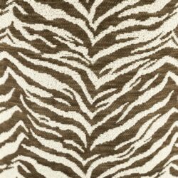 Zebra print tapijt in bruin en wit, ideaal voor stijlvolle woon- en slaapkamer interieurs.
