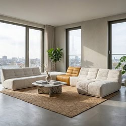 Zachte moderne hoekbank in een minimalistisch woonkamer met groot raampartij en natuurlijke natuurlijk, perfect voor stijlvolle en comfort meubel van Mokana meubels.