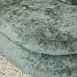 Luxueuze velvet fauteuil stoffering met elegante blauwe green tint, comfortabel en stijlvol meubelstuk voor moderne interieurs.