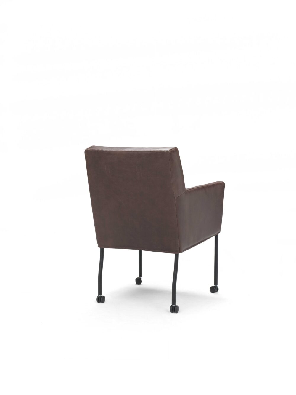 Elegant leren fauteuil met wieltjes, modern ontwerp, comfortabel en stijlvol stuk voor woonkamer of kantoor. Perfect voor een luxe en functionele interieurafwerking.
