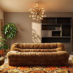 Zachte velvet bank in retrostijl met ronde vormen, perfect voor een stijlvolle woonkamer inrichting.