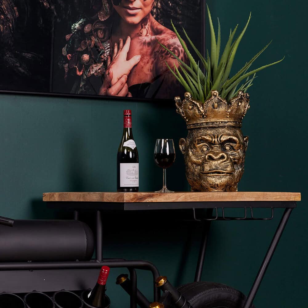 Unieke houten salontafel met metalen frame, perfect voor moderne interieurs.