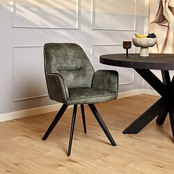 Vintage groene eetkamerstoel met comfortabele bekleding en zwarte houten poten, perfect voor modern en industrieel interieur.
