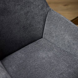 Hoge resolutie close-up van een moderne, zitbank met donkergrijze stoffering, perfect voor een eigentijdse woonkamer of kantooromgeving.