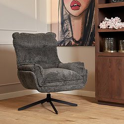 Lichtgrijze vintage draaibare fauteuil met comfortabele bekleding en moderne zwart metalen onderstel, passend in elk modern interieur, ideaal als stijlvolle en relaxte zithoek.