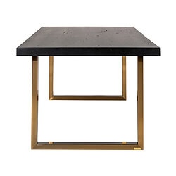 Modern zwart marmeren tafel met goudkleurige metalen frame, perfect voor een luxe eethoek of woonkamer. Duurzaam en stijlvol meubel van Mokana Meubelen.