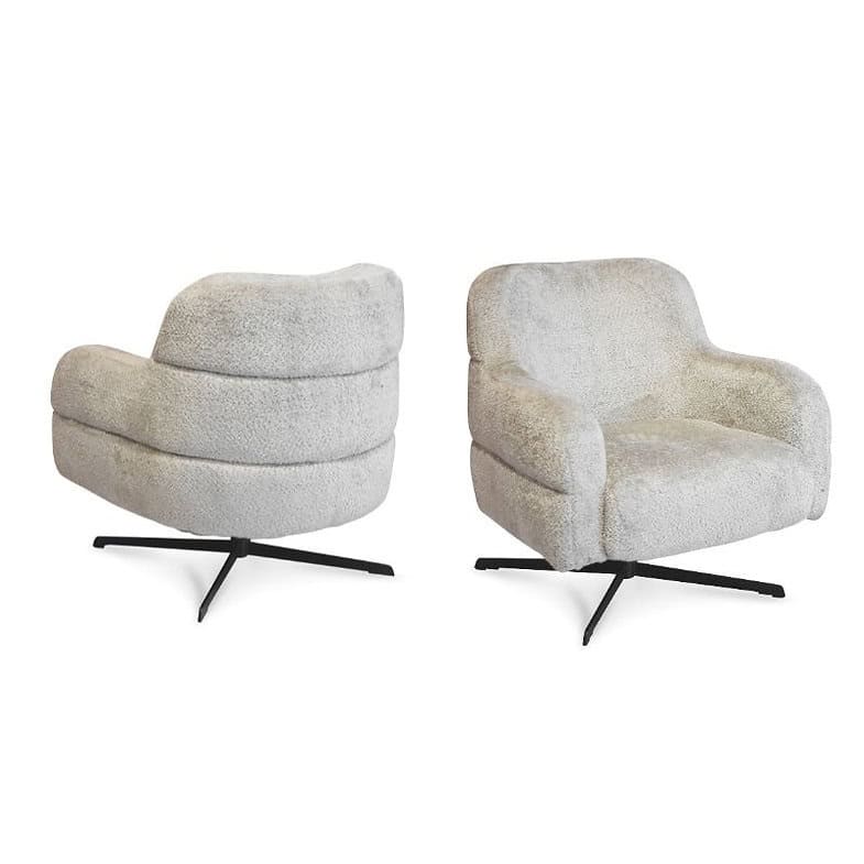 Zeer comfortabele vintage stijl fauteuils met warm, wollig stof en zwart metalen pootjes, perfect voor modern en retro-interieurs.