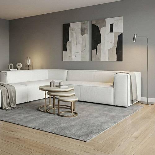 hoekbank-summer-toledo-leder-bianco Modern diningkamer met Mokana meubelen, strakke witte hoekbank, houten salontafel sets en geometrische kunstwerken, straalt luxe en minimalisme uit, perfecte interieurstijl voor een stijlvolle woonkamer.