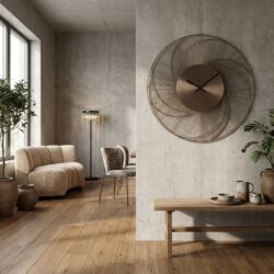 Ronde gouden wandklok Denver met subtiele zonnestraaltextuur