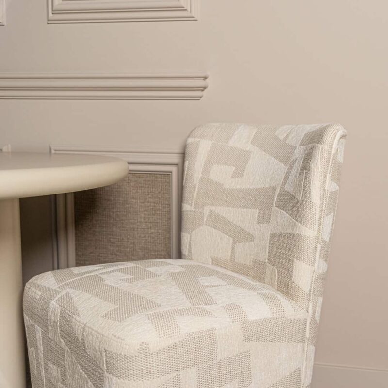 Eetkamerstoel Lorain beige graffic on wheels