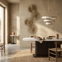 Wandlamp Linzi brushed gold, unieke verlichting met amber-gouden kleur en ijzeren frame