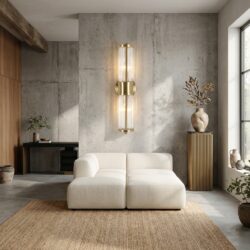 Wandlamp Lyan brushed gold, cilindervormig glas en goudkleurig ijzer