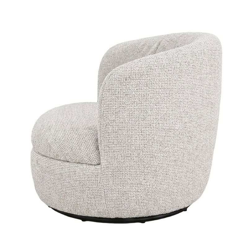 Britt Beige fauteuil in een moderne leeshoek