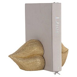 Zilveren Dior boek met gouden hartvormige ornament, luxe decoratie accessoire, elegant design, perfect voor interieurstyling en geschenkidee, hoogwaardige materialen, exclusieve uitstraling.