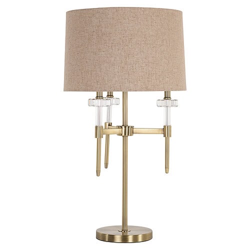 Moderne tafel- of bureau lamp met beige stoffen kap en gouden metalen basis, perfect voor interieurdecoratie en functioneel gebruik.
