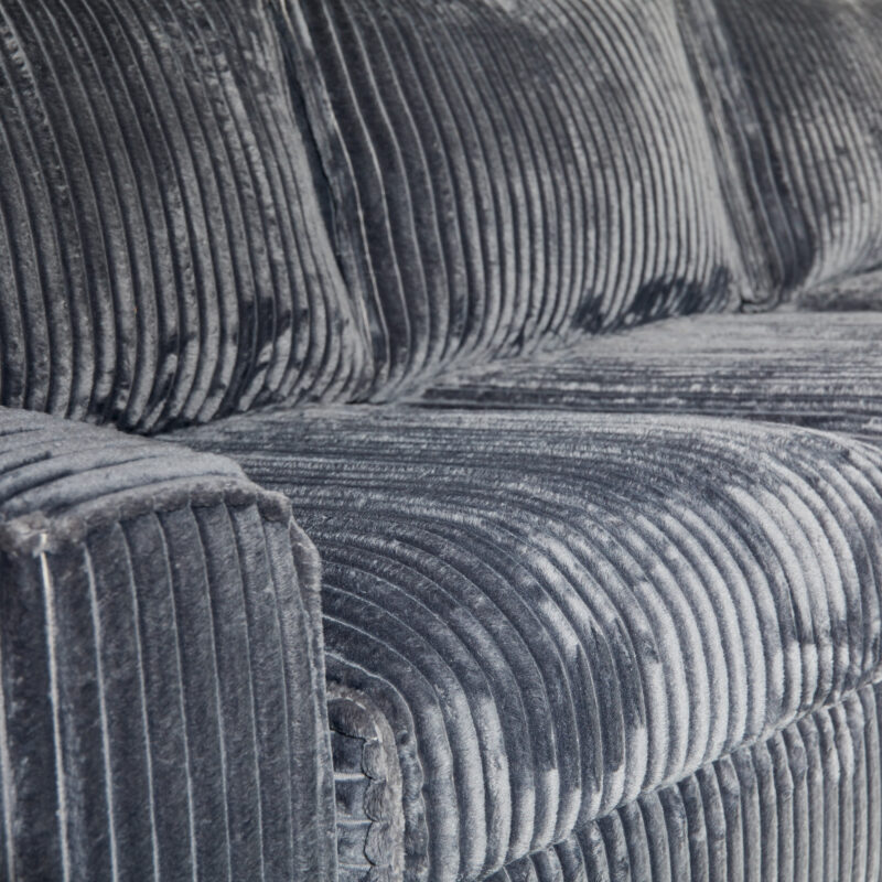 Textuur van de ribstof op de hoekbank MySofa Teddy