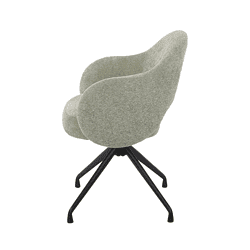 Moderne Mokana stoel met zachte bekleding en zwarte metalen poten, perfect voor een stijlvolle en comfortabele zithoek.