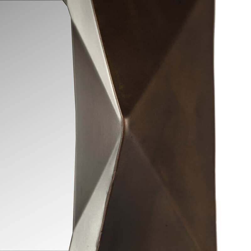 Close-up van een modern metalen tafelonderdeel, benadrukt de strakke lijnen en hoogwaardige afwerking, perfect voor op maat gemaakte meubelontwerpen.