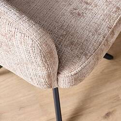 Comfortabele draaibare eetkamerstoel Bella in beige stof met zwarte poot, perfect voor moderne eetkamers en interieurdesign.