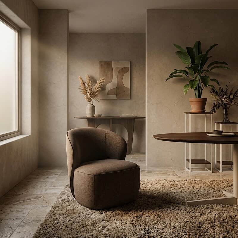 Gezellige woonkamer met een comfortabele fauteuil, planten en minimalistisch interieur, perfect voor een moderne en rustige woonruimte.