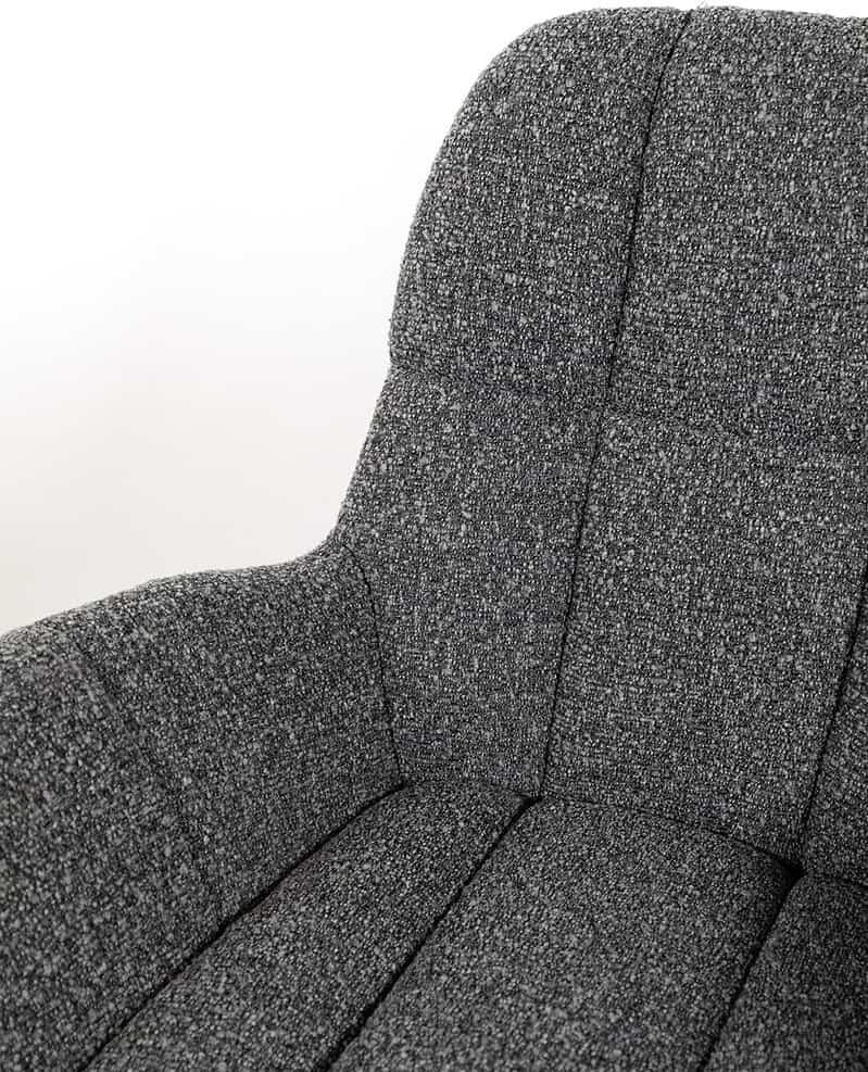 Comfortabele Mokana fauteuil met zachte, duurzame bekleding in een moderne stijl, perfect voor woonkamer of kantoor.