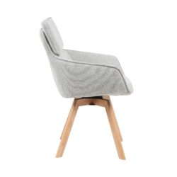 Draaibare eetkamerstoel Jona taupe aan eettafel in modern interieur