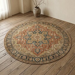 Ronde vintage tapijt met bloemmotief in warme aardetinten, perfect voor een gezellige woonkamer of slaapkamer. Handgemaakt met traditioneel ontwerp, voegt karakter toe aan elk interieur.