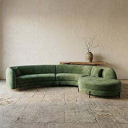 Bank met ronde poef in groene velvet, modern en comfortabel meubelstuk voor woonkamer.