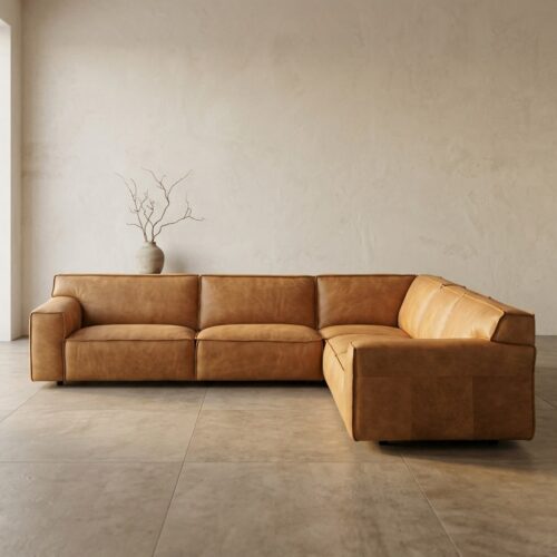 Leren hoekbank in woonkamer Luxe leren hoekbank in een moderne woonkamer, perfect voor comfortabel loungen en stijlvolle interieurdecoratie.