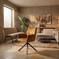 Luxe gouden velvet eetkamerstoel Dani met armleuning, perfect voor een stijlvolle eetkamer of woonkamer.