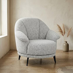 Bank Mokana Meubelen, comfortabele en stijlvolle fauteuil in een lichte stof. Perfect voor een moderne woonkamer met natuurlijke decoratie.