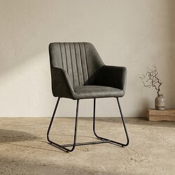 Ein eleganter, bequemer Sessel mit gepolsterter Sitzfläche und Rückenlehne, perfekt für ein modernes Wohnzimmer oder Büro.