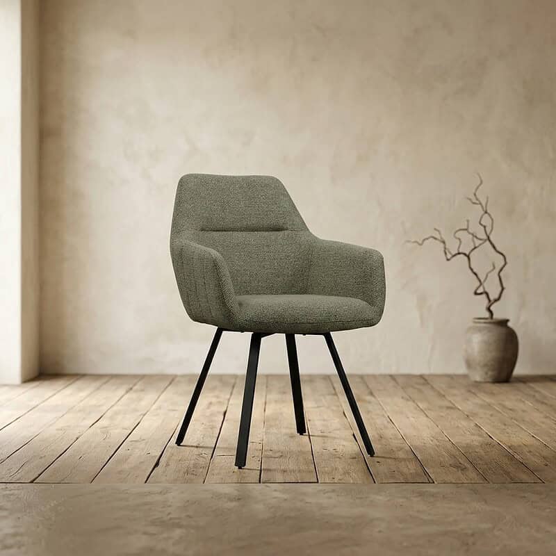 Moderne groene fauteuil met houten poten, perfect voor een stijlvolle en comfortabele zithoek in een modern interieur.