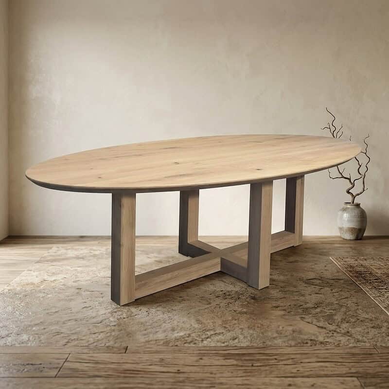 Moderne massief houten eettafel met ovale vorm en strakke poten, perfect voor een stijlvolle eetkamer. Gemaakt van hoogwaardig hout, combineert functionaliteit met elegantie.