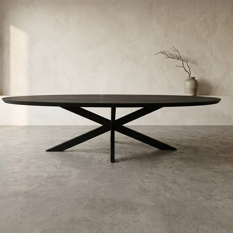 Moderne zwarte eettafel met uniek onderstel in minimalistisch interieur, perfect voor stijlvolle eetkamers en woonruimtes.