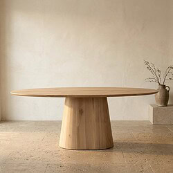 Moderne massief houten eettafel met ronde vorm en natuurlijke afwerking, perfect voor een stijlvolle eetkamer of woonruimte.