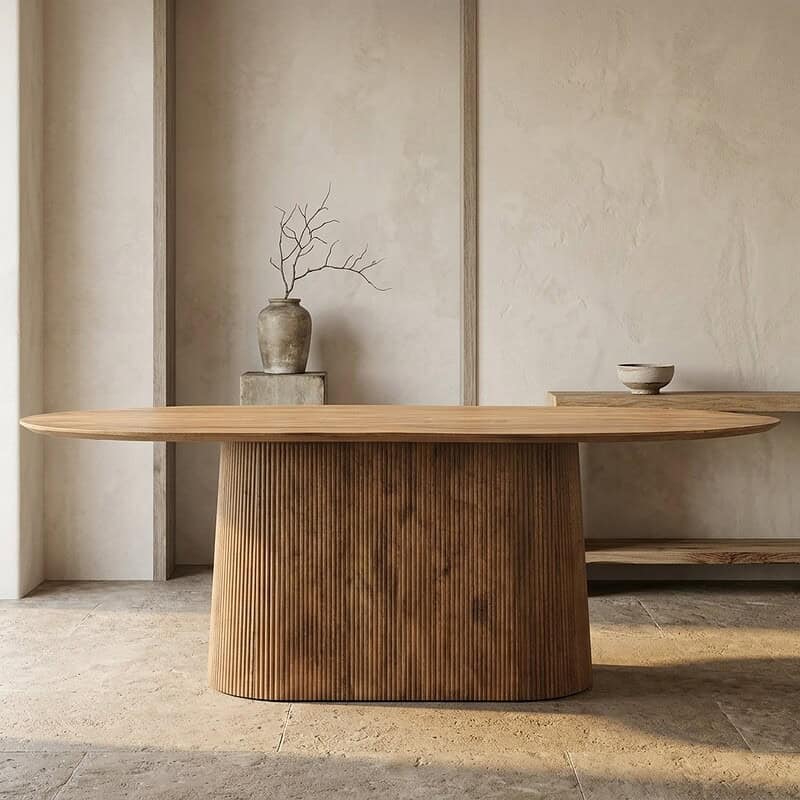 Eettafel van massief hout met ronde vorm, modern en minimalistisch design, perfect voor een stijlvolle eetkamer.